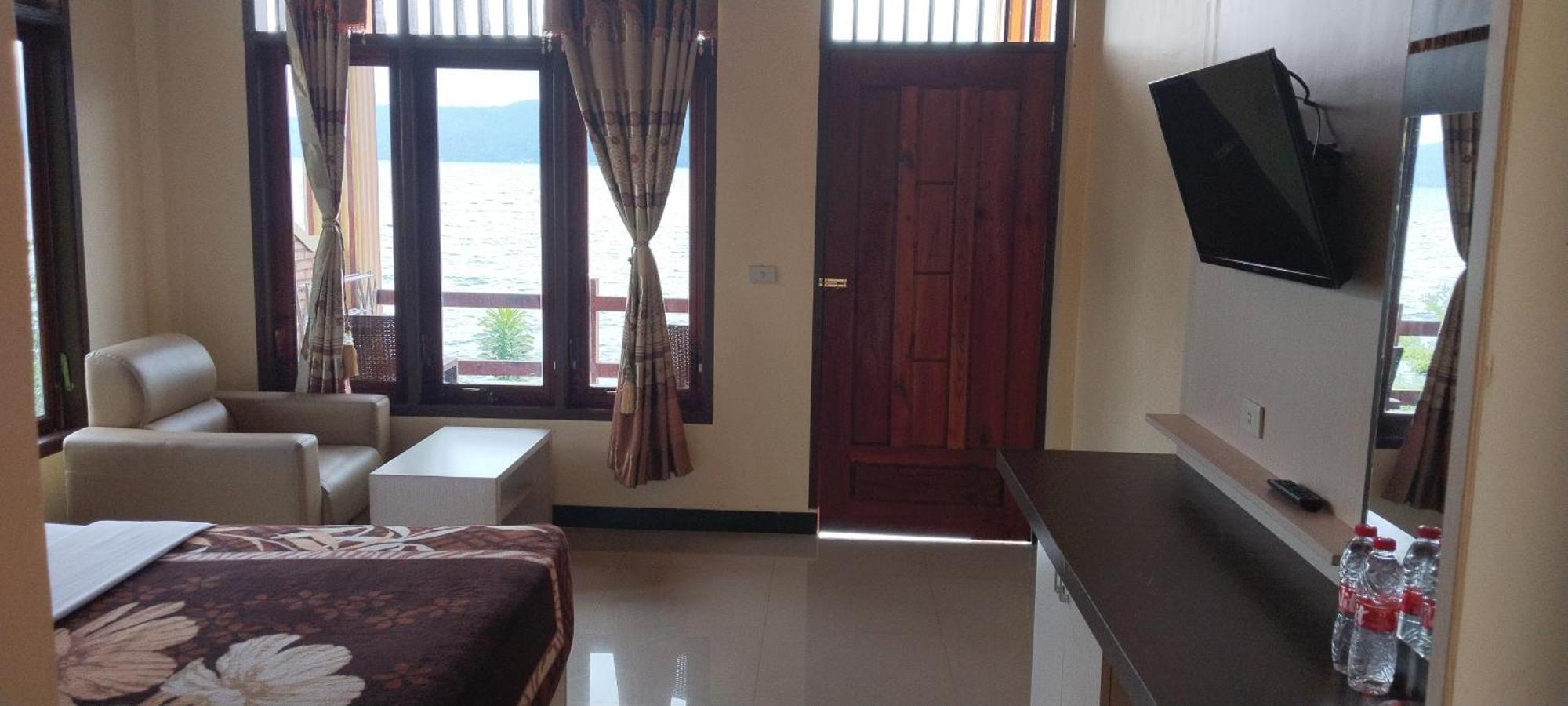 Mas Cottages Tuktuk Siadong Quarto foto