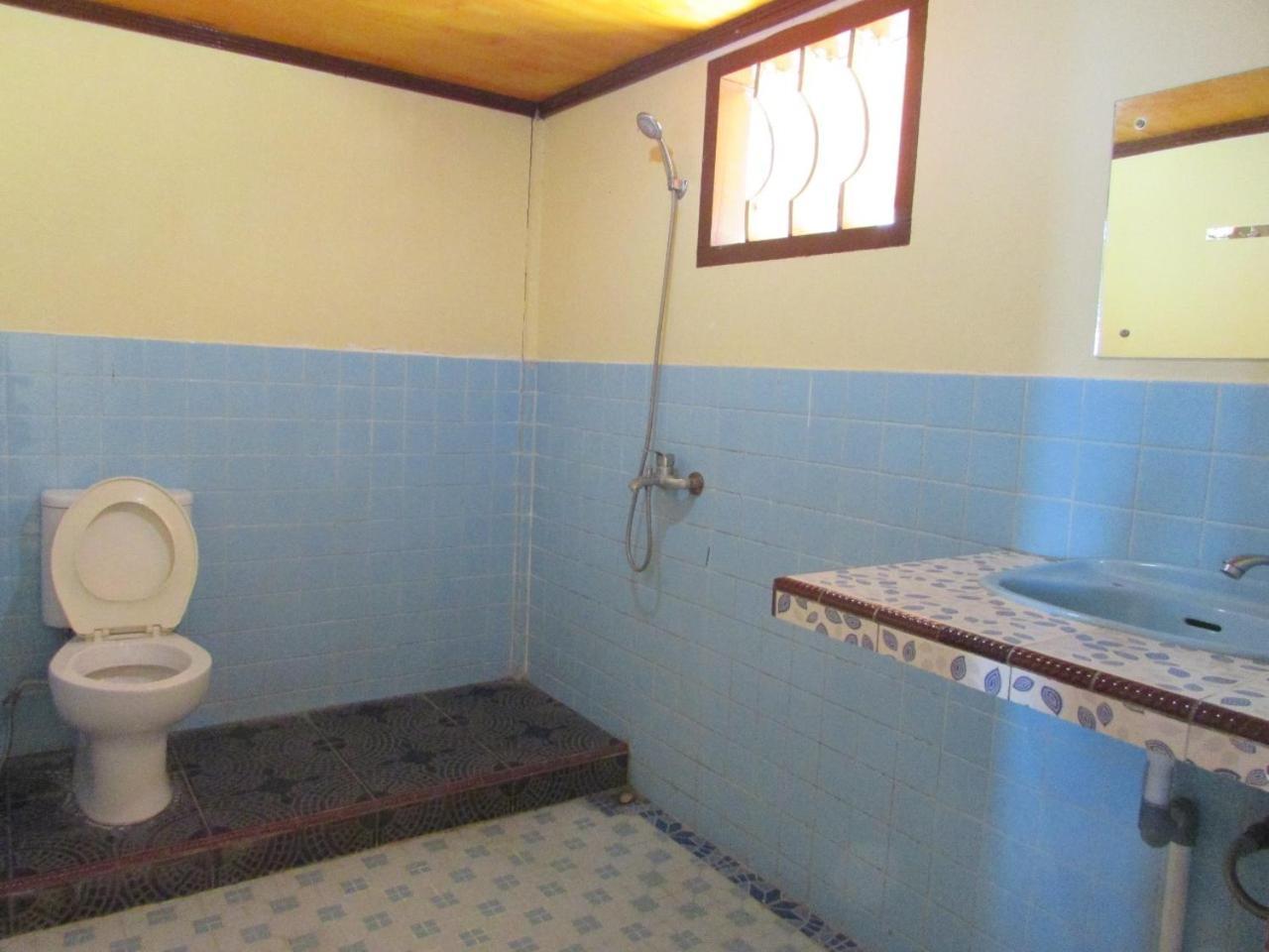 Mas Cottages Tuktuk Siadong Quarto foto